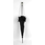 A late Victorian black lace and ostrich feather trimmed ladies parasol,