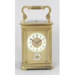 A late 19th century brass cased repeater carriage clock,