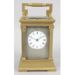 A late 19th century gilt metal cased repeater carriage clock,