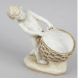 An Amphora figure modelled as an upstanding semi naked boy,