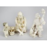 A 19th century oriental carved ivory figure group,