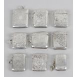 A group of eight assorted silver vesta cases,