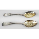 A pair of George III silver 'berry' dessert spoons,