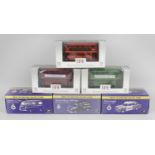 A large mixed selection of assorted boxed diecast model vehicles,