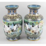 A pair of oriental cloisonné vases,