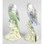 Two Beswick ornaments modelled as budgies,