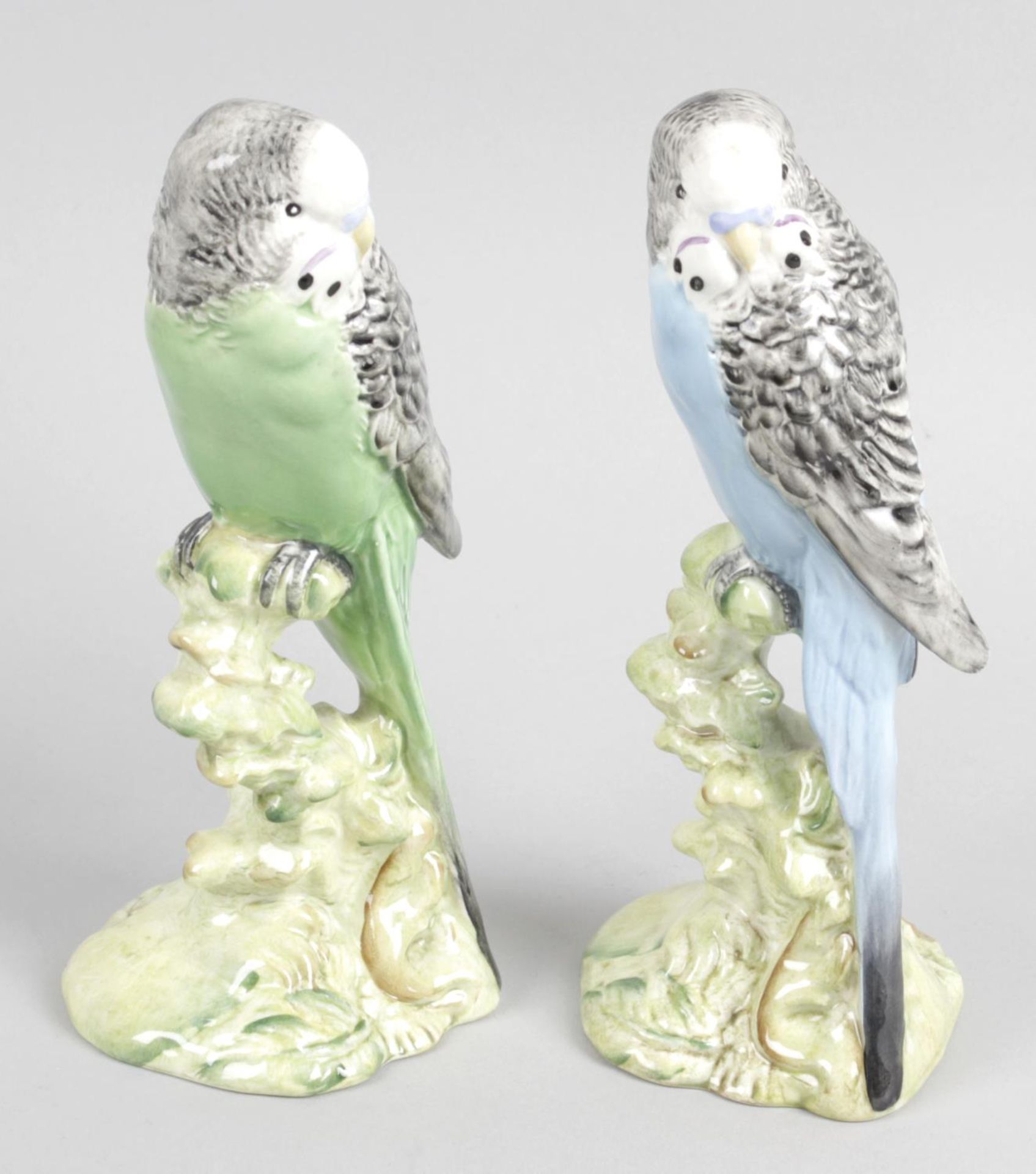 Two Beswick ornaments modelled as budgies,
