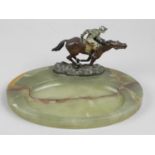 A green marble ashtray,