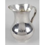 A modern Christofle silver plated water pitcher,