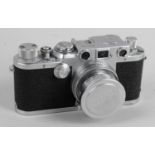 A Leica model IIIF vintage rangefinder camera body,