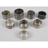 A selection of eight assorted silver napkin rings,