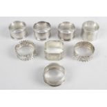 A selection of eight assorted silver napkin rings,