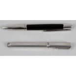 A silver Montegrappa fountain pen,