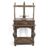 A 19th century turned and carved oak book press,