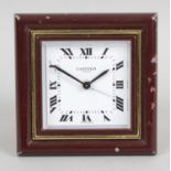 A Cartier quartz easel style travel alarm clock,