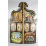 A 19th century carved wooden religious icon wall hanging,