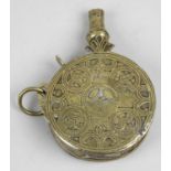 An antique eastern brass powder flask,