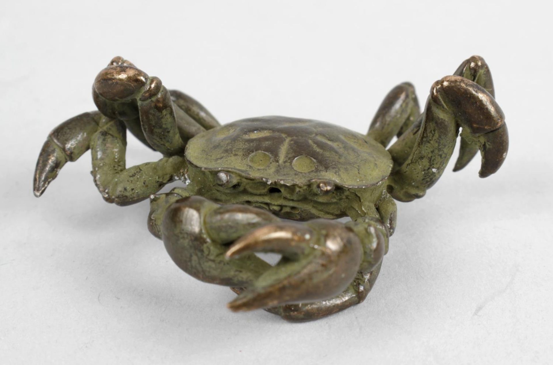 A small oriental cast bronze study of a crab, 2.5 (6.25cm) wide.