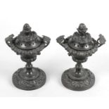 A pair of 19th century bronze potpourri containers,