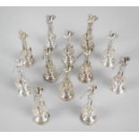 A set of twelve modern silver menu or name card holders,