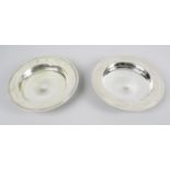 Two cased modern silver Armada dishes, each of plain circular form.