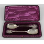 A pair of Victorian silver serving spoons,
