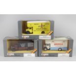 A large mixed selection of assorted boxed die cast model vehicles,