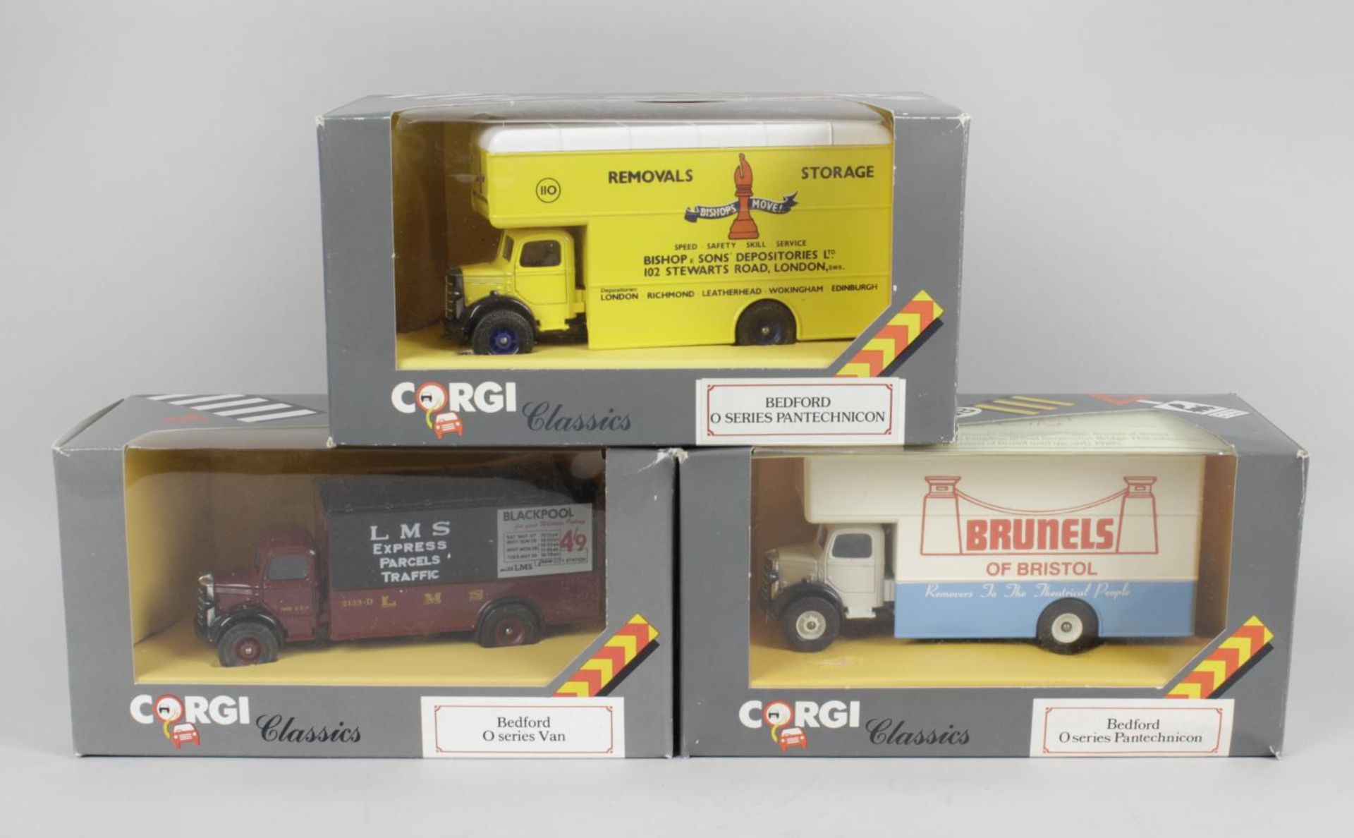 A large mixed selection of assorted boxed die cast model vehicles,