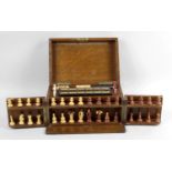 A late 19th century oak cased games compendium,