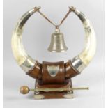 A late 19th century oak and cow horn mounted table bell,