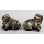 A pair of late 19th century Chinese carved Dogs of Fo,