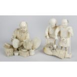 A 19th century oriental carved ivory figure group,