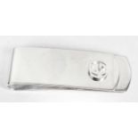A silver Gucci money clip, with applied Gucci double G logo.