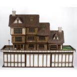 Robert Stubbs, a 1/12th scale Tudor style wooden dolls house,