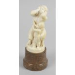 L Kuchler, a 19th century carved ivory figure group,