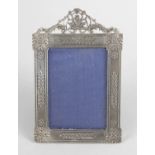 An Egyptian silver mounted easel back photograph frame,