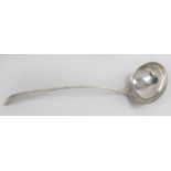 A George III Scottish silver soup ladle, in plain Old English pattern with initialled terminal.