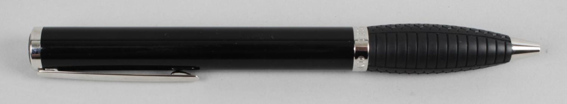 A Chopard ball point pen,