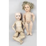 A collection of assorted dolls,