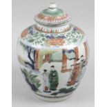 An antique Chinese Wucai jar and cover,