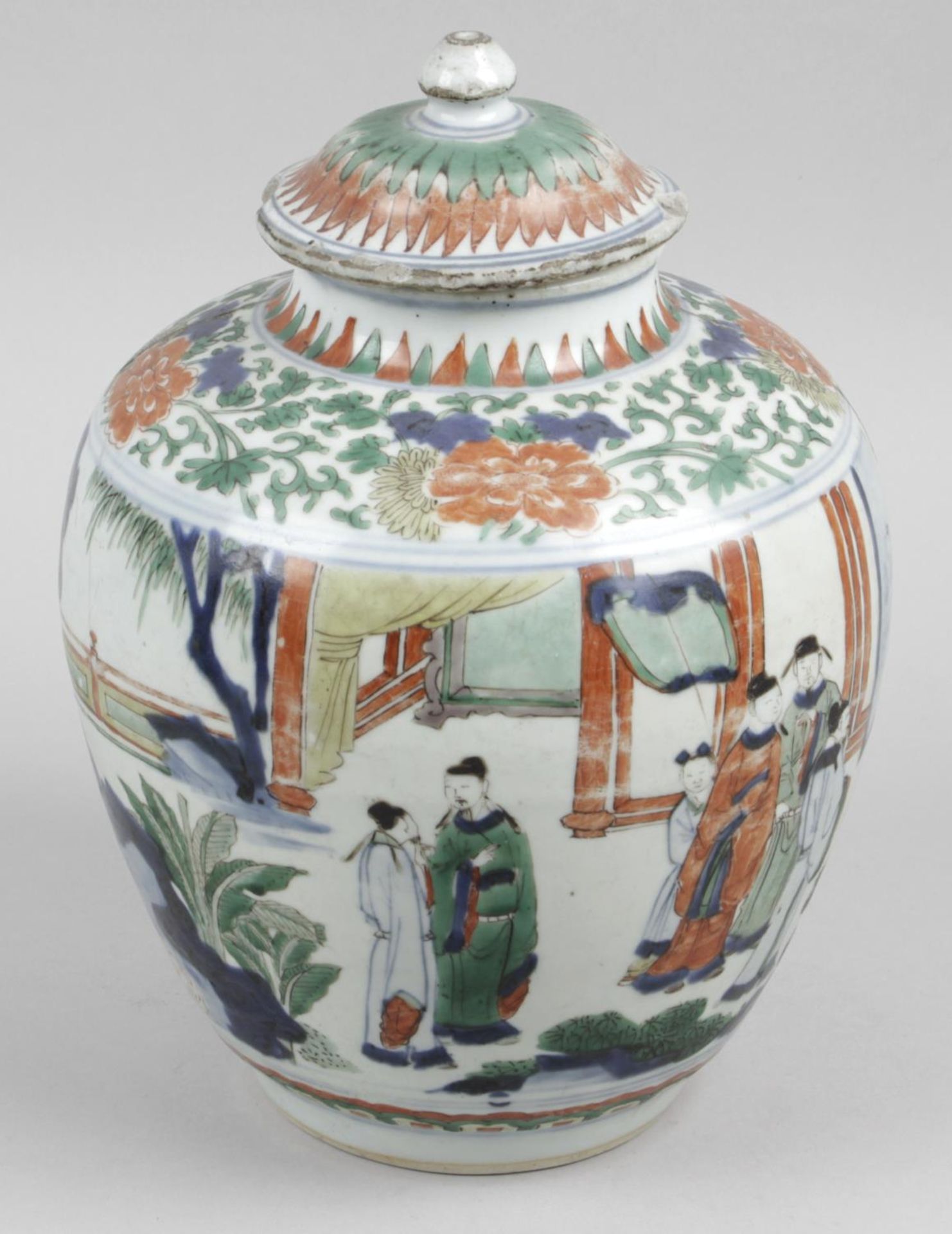 An antique Chinese Wucai jar and cover,