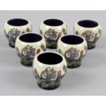A set of six Moorcroft pottery egg cups,