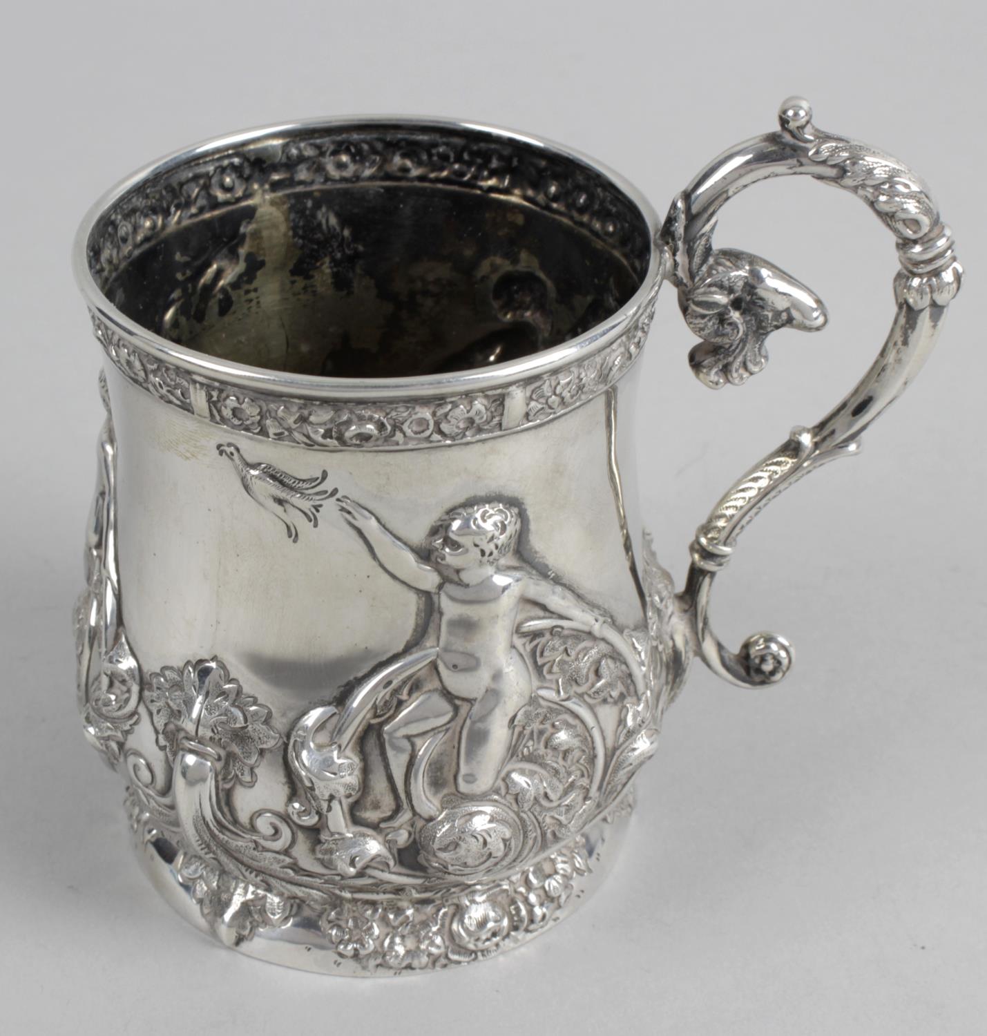 An Edwardian silver mug,