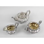 A George IV silver three piece tea service,