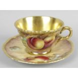 A Royal Worcester bone china cup and saucer,