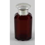 A late Victorian silver mounted ruby glass scent bottle,