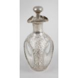 A Chinese export sterling silver overlay decanter,