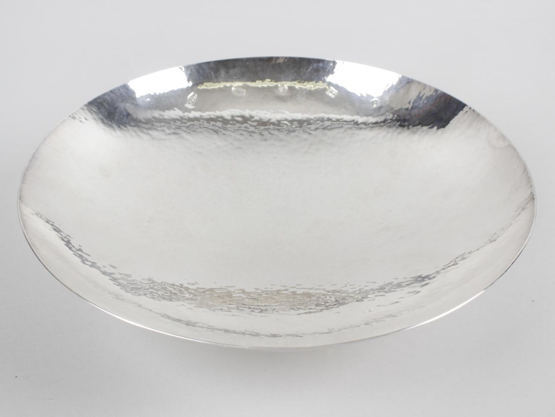 A modern silver dish,