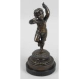 A Victorian cast bronze figure modelled as a young infant,