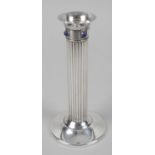 A Cartier silver plate candlestick,